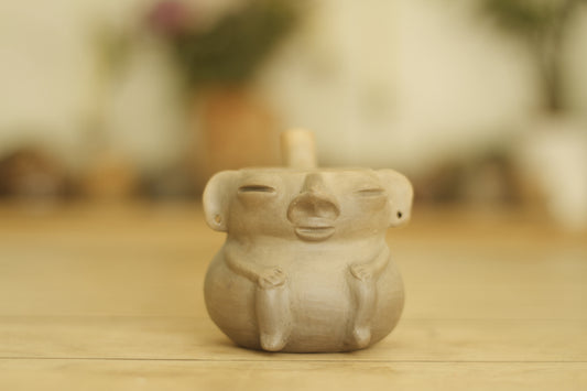 Abuelo Meditating Sitting Orejon Chocolatero